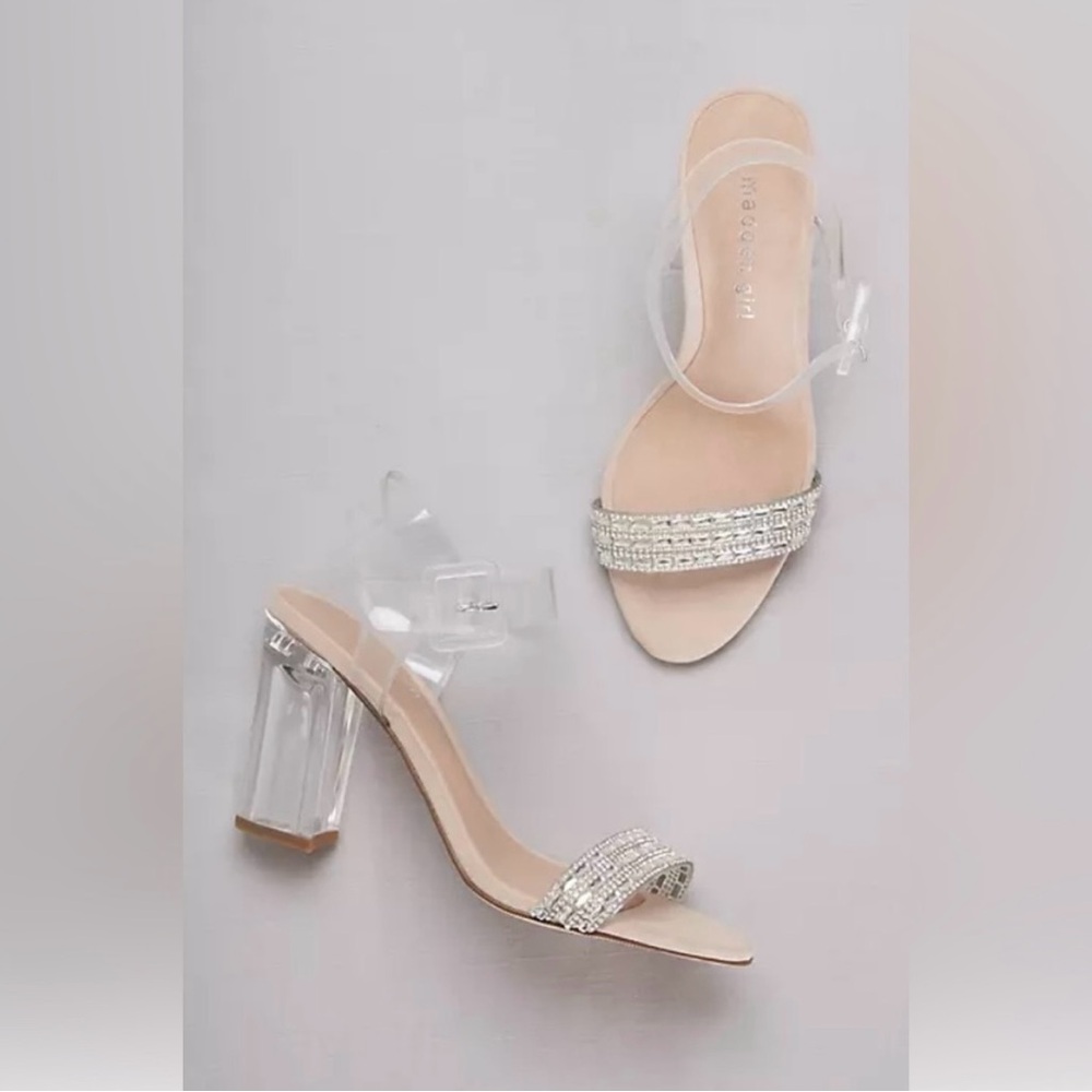 Steve Madden Clear Strappy Nude 
3 1/2" Heels. Excellent condition! Size 7